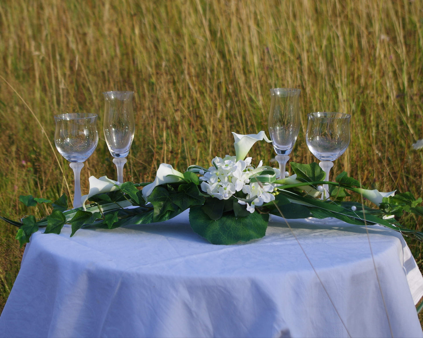 Tischgesteck Callas und Hortensien