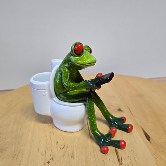 Frosch auf dem Klo