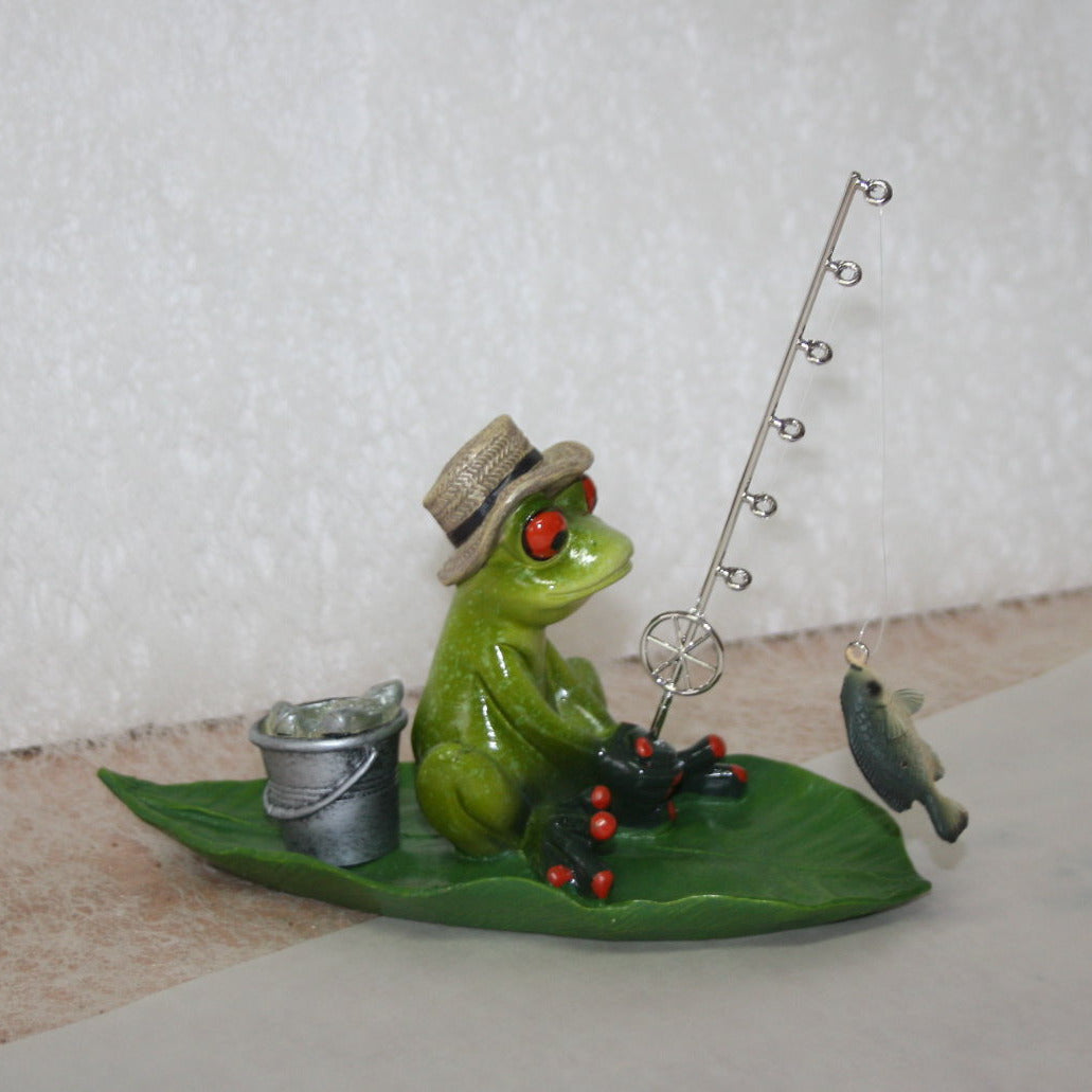 frecher Angler Frosch auf Blatt