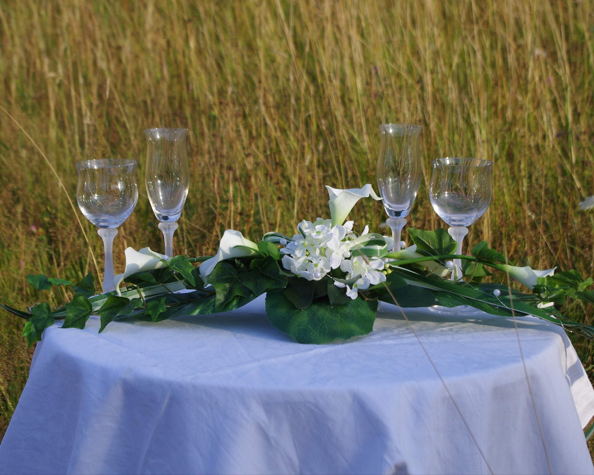 Tischgesteck Callas und Hortensien