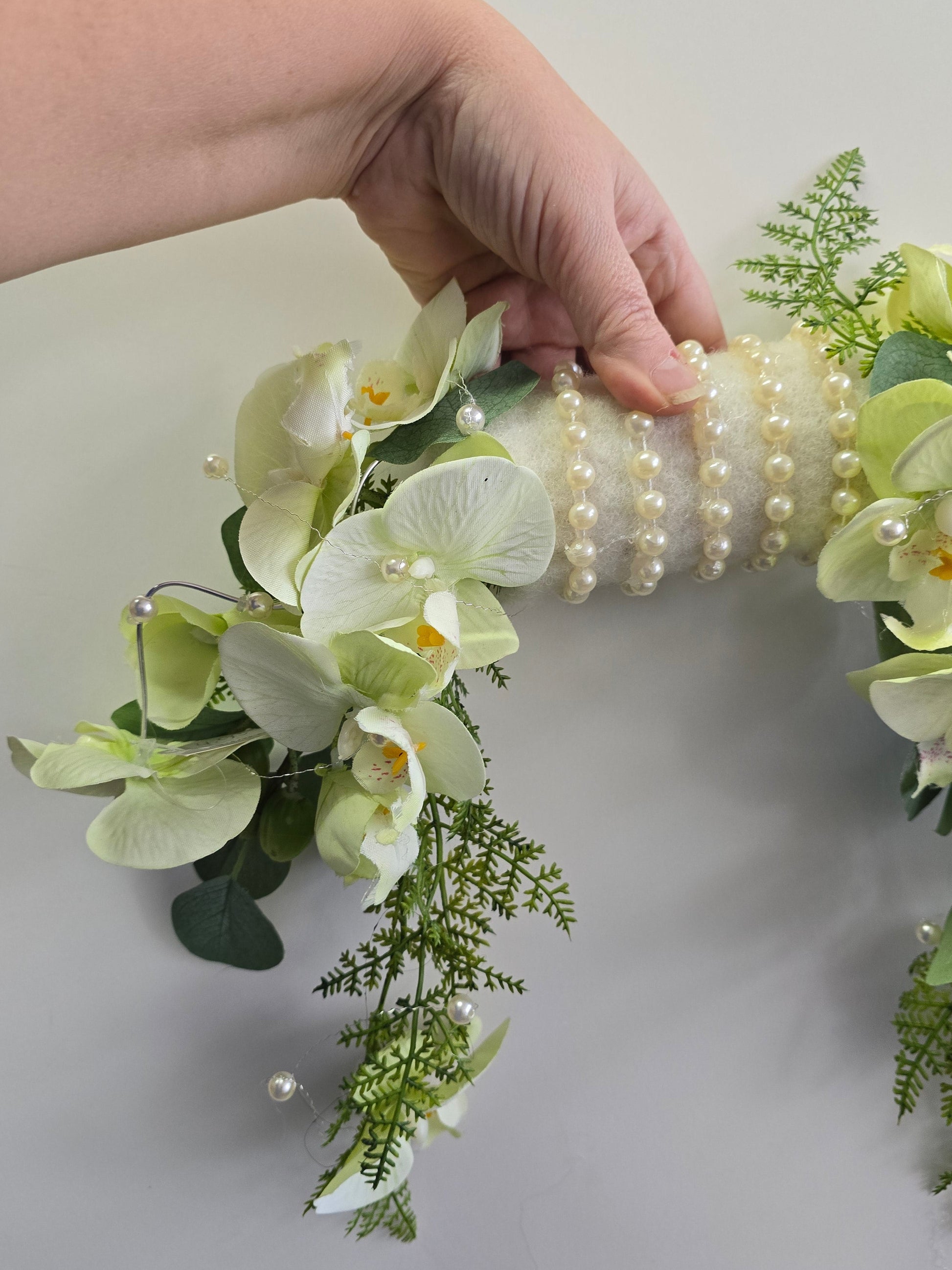 zarter perlenstrauss orchidee